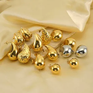 Waterdrop stud earrings in gold and silver plating with hammered texture and pave stones