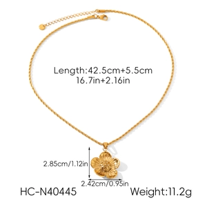Detail of gold flower pendant with stone inlay and twisted rope chain dimensions