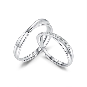 S925 sterling silver Mobius couple rings with sparkling pavé stones on white background