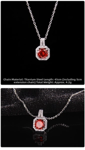 Detail of red zircon pendant necklace in silver finish titanium steel with crystal halo