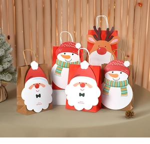 Detail showing 3D cartoon Santa and reindeer designs on festive Christmas paper gift bags