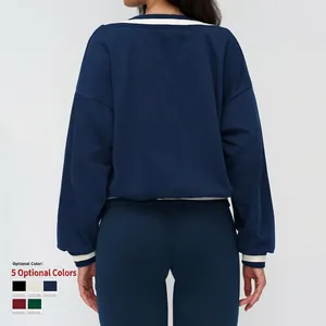 Navy blue V-neck sports sweatshirt with contrasting cream stripes on cuffs and hem