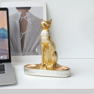 Golden Egyptian Bastet cat goddess tealight candle holder with hieroglyphic base carving