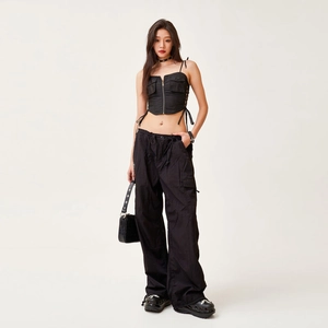 Women's black cargo jumpsuit set with wide leg trousers and tactical crop top