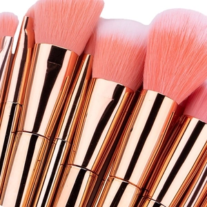 12pcs rose gold makeup brush set with pink synthetic bristles on white background