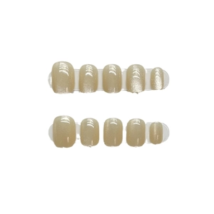 Champagne gold cat eye press-on nails set in short round shape with glitter finish