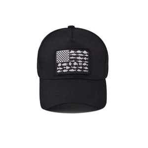 Detailed view of black trucker hat with US flag fish patch and breathable mesh