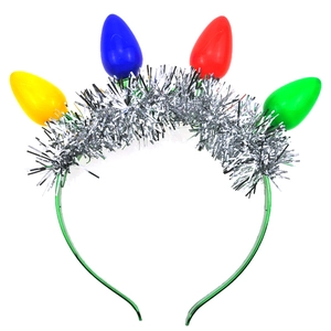 Detail of Christmas headband with colorful light bulbs and silver tinsel wreath