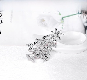 Silver Christmas tree brooch back view with metal pin and sparkling rhinestone inlay