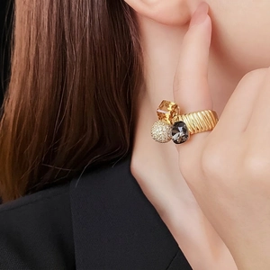 Vintage gold plated ring featuring yellow square crystal and grey teardrop stone