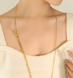 Detail of 18k gold plated stainless steel necklace with adjustable OT toggle clasp
