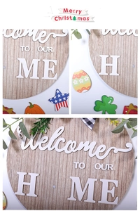 Detail of wooden welcome sign with interchangeable holiday icons for home door decor