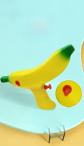 Detail of yellow banana water gun showing the leak-proof seal and spray nozzle design