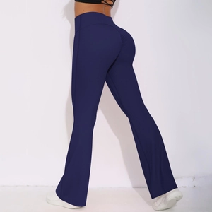 Detail view of navy blue high-waisted flared yoga pants with scrunch butt lifting seams