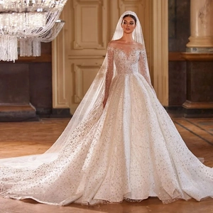 Luxury off-shoulder ball gown wedding dress with long sleeves and sequins in grand palace