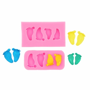 Macro detail of baby feet silicone mold for fondant, chocolate and clay crafts