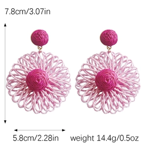 Pink raffia flower drop earrings with dimensions 7.8cm height and 5.8cm width specs