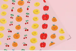 Detailed view of 5D thin nail stickers featuring cute cartoon fruit patterns and expressions