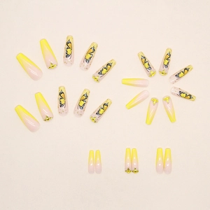 Uñas postizas de bailarina largas con diseño de mariposa amarilla y pedrería brillante
