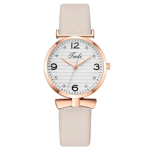 Fashionable rose gold women's watch with bow decor, rhinestone dial and beige leather strap