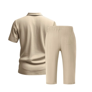 Detailed macro view of the beige men's linen polo shirt and trousers waffle fabric texture