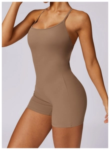 Side view of brown bodycon athletic bodysuit showing U-neckline and slim fit design
