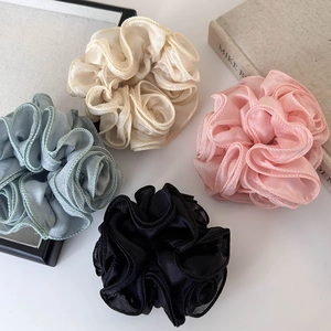 Elegant organza flower scrunchies in pastel colors for high-quality hair styling accessories