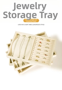 Stackable beige velvet jewelry organizer trays for rings necklaces and earrings storage