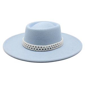 Close-up of light blue wool felt hat featuring elegant triple-row white pearl decorative band