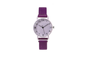 Detail of purple quartz watch featuring diamond-cut glass and magnetic Milanese strap