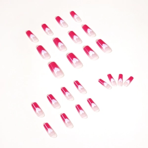 Raspberry gradient coffin press-on nails with white heart design on 24 piece set