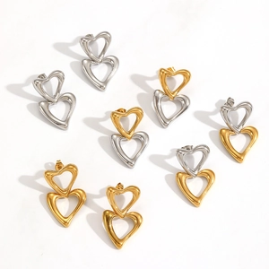 Double layered heart stud earrings in gold, silver and mixed tones with a polished finish