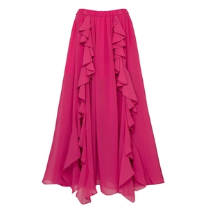 Detail of rose red long skirt with ruffled layers and a wavy fishtail hemline