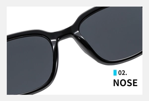 Close-up of sleek black sunglasses nose bridge showing polished finish and ergonomic design