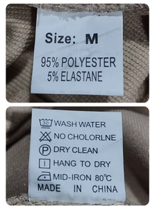 Detailed view of clothing labels showing 95% polyester fabric content and care instructions
