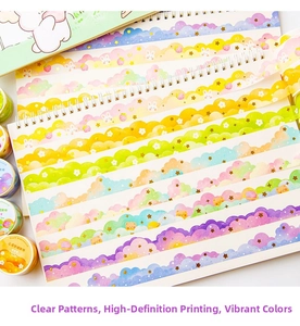 Detail of dreamy cloud washi tape strips in pastel colors on notebook page