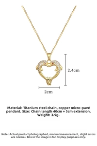 Macro view of crystal paved heart dolphin pendant showing 2x2.4cm scale details