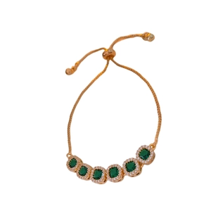 Adjustable gold bracelet with square green zircon stones and sparkling halo setting