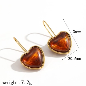 Golden heart-shaped stainless steel drop earrings with amber tortoiseshell resin inlay