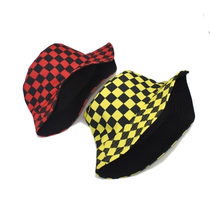 Double-sided reversible bucket hat with red and yellow checkered plaid patterns