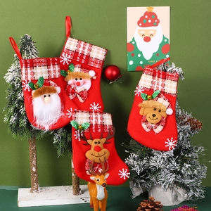 Set of 4 festive Christmas stockings with 3D Santa, Snowman, Reindeer, and Bear designs