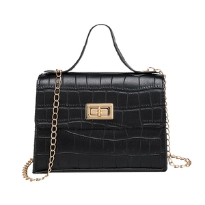 Classic black crocodile pattern handbag with gold metal chain strap and twist lock