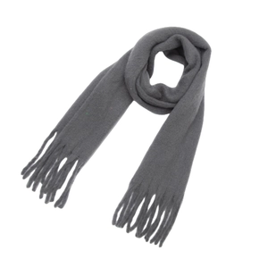 Macro detail of thick grey mohair scarf texture showing soft fabric and fringe tassels