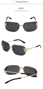 Detail view of rimless square sunglasses with rhinestone butterfly and gold metal frame