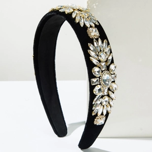 Detail of velvet headband with sparkling geometric crystals and rhinestones cluster