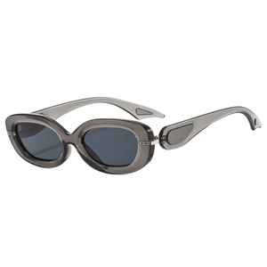 Retro oval sunglasses with translucent grey frames and stylish hollowed-out temples