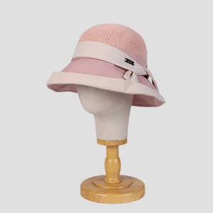 Elegant women's pink sun hat with breathable mesh and bow decoration