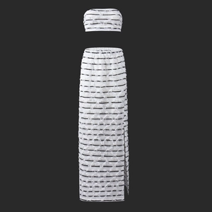 Detail of white striped crop top and skirt set with unique 3D fringe texture