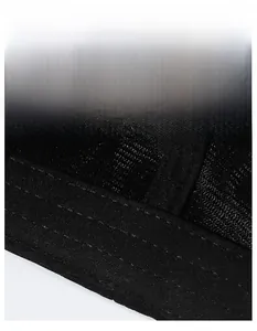 Detail of moisture-wicking sweatband and breathable mesh fabric on black baseball cap