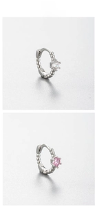 Detail of beaded huggie earrings with white and pink cubic zirconia gemstones
